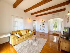 a living room with a couch and a table at Villa Tequila in Adeje