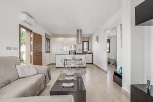 a living room with a couch and a table at Casa Romero in Campano