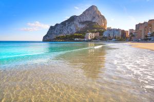 a view of a beach with a mountain in the background at Calpe Beach in Calpe