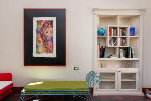 a living room with a couch and a table at Hora Vona in Orosei