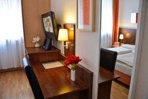 Cama ou camas em um quarto em Hotel Italia