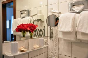 Um banheiro em Hotel Italia