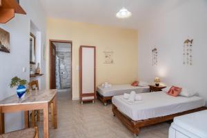 Llit o llits en una habitació de Mesaria Studio