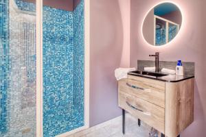 a bathroom with a sink and a shower at L'envie Eymet in Eymet +38 photos