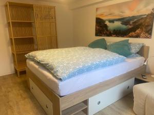 a bedroom with a bed in a room at Fewo1 Am Edersee in Edertal