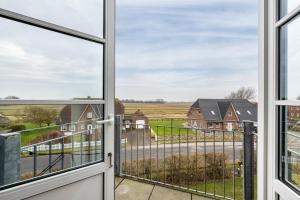 a view from the window of a house at Inselliebe in Pellworm