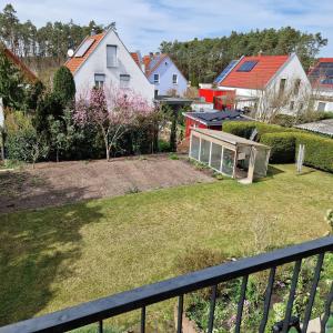 a view of the backyard of a house at Ferienwohnung Mawitha in Roth