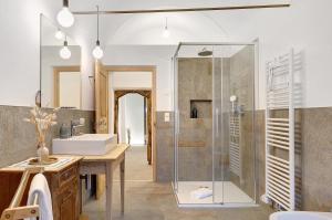 a bathroom with a shower and a sink at Alpin Chalet Samer Apt Bauernstube in Sarntal +30 photos
