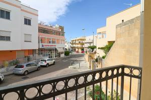 a view of a city street from a balcony at Casa Samira a Otranto in Otranto
