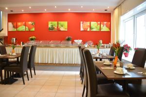 Um restaurante ou outro lugar para comer em Hotel Italia