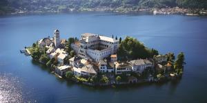 an island in the middle of a large body of water at Casa Lago Leo in Omegna