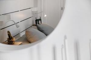 a room with two pillows on a bed at Apartamento La Estrella 4 in Arrecife +25 photos