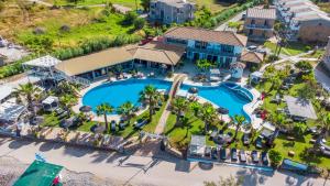 an aerial view of the pool at the resort at Mirage Arillas Villa Apartment in Arillas +15 photos