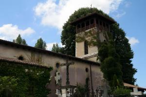a building with a clock tower on top of it at Maison Amalur in Arcangues