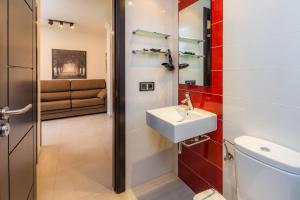 a bathroom with a sink and a toilet at Neo in Cala Ratjada +17 photos