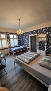 a bedroom with two beds in a room at Studio zur »Alten Schmiede« in Laage