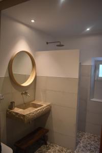 a bathroom with a sink and a mirror at Finca Can Nou in Sóller +23 photos