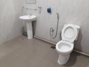 a bathroom with a toilet and a sink at Wishwa Villa in Weligama +29 photos