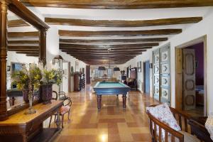 a hallway with a pool table in a house at Casa Espigol in El Bruc