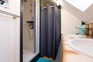 a bathroom with a shower and a sink at Logement Rieux À 6 Km De Redon in Rieux +13 photos