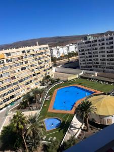 an aerial view of a large apartment complex with a swimming pool at Mirador los molinos in San Bartolomé