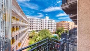 a balcony with a view of buildings at Costacabana - Apartment Dali in Lloret de Mar
