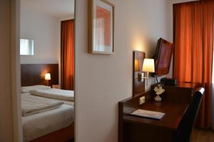 Cama ou camas em um quarto em Hotel Italia