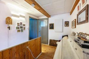 a room with a wooden partition and a door at Ferienwohnung auf dem Wald 4 Per in Görwihl