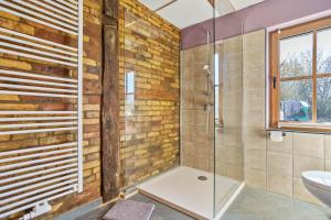 a bathroom with a shower and a sink at Kleiner Eselhof in Semlow