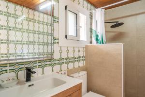 a bathroom with a sink and a toilet at Gesgroup in Lloret Blau