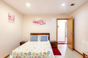 a bedroom with a bed in a room at Casa de Balinhas - Gerês in Ventosa +34 photos