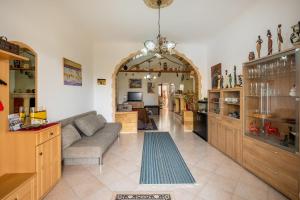 a living room with a couch and a table at Villa Salento in Cellino San Marco