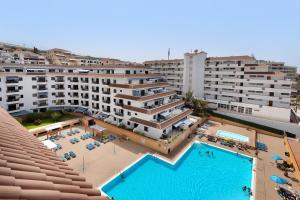 an aerial view of a hotel with a swimming pool at Carpediem Playa La Arena in Puerto de Santiago
