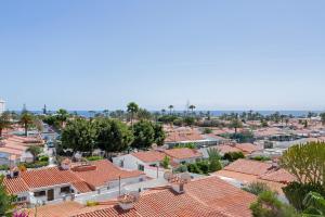 an aerial view of a town with roofs at Apartamento Yumbo Maspalomas in Maspalomas