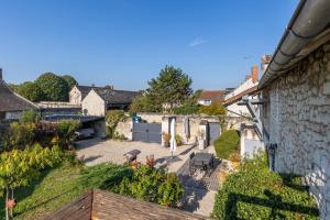 an aerial view of a yard with a house at Au Bo Voyage in Tavant