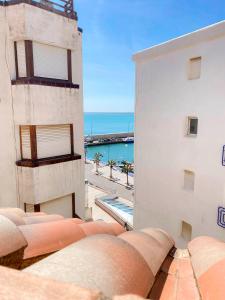 a view of the ocean from a building at Constance in L'Ampolla