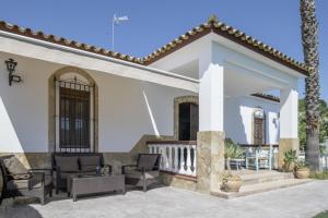 a rendering of a house with a patio at Finca Arroyuelo in Prado del Rey