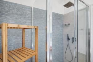 a shower with a wooden ladder in a bathroom at Moneglia Mare in Moneglia +27 photos