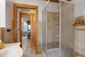 a bathroom with a shower and a sink at Casa Michod - Nonno Marcel in Châtillon +22 photos