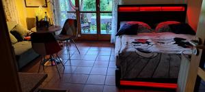 a bedroom with a bed with shoes on it at Ferienwohnung Chiemgau - erleben in Siegsdorf