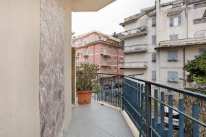 a balcony with a view of some buildings at Vivere Lerici con parcheggio in Lerici