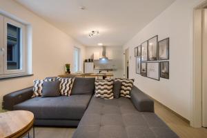 a living room with a couch and a table at Wohnung 4 Rosenstraße in Cham