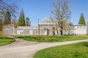 a large house with a pathway in front of it at Ferienwohnung Kupfer in Niestetal