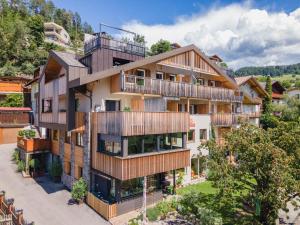 an aerial view of a building with balconies at Sonnleiten Sonne Mond u Sterne in Collepietra