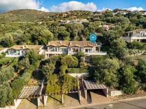 an aerial view of a house in a suburb at Villa Daisy in Quartu SantʼElena