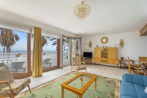 a living room with a view of the ocean at Casa Mara in Sauzal