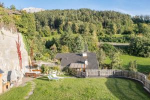 an aerial view of a house on a hill at App Schlern - Gasser in Vols am Schlern