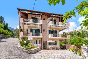 a building in the middle of a street at Nikoleta Apartment 2 in Nikiana