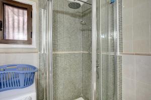 a shower with a glass door in a bathroom at Las Fuentes in Arona +15 photos