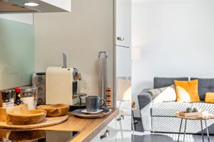 a kitchen with a table with bread on it at Fewo-Keinath in Winterlingen +20 photos